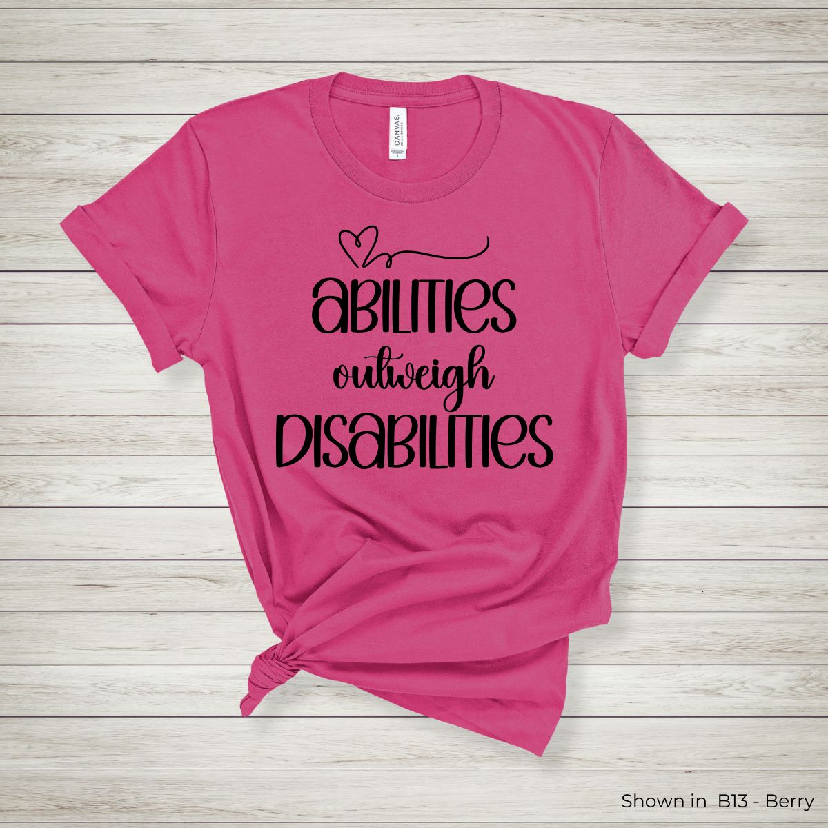 IC104 - Abilities Outweigh Disabilities Tee