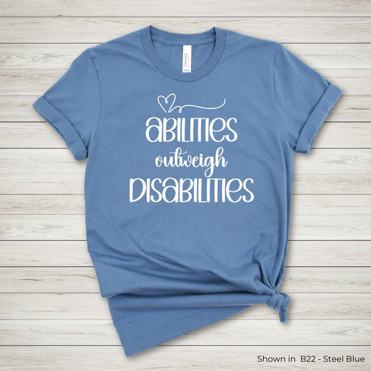 IC104 - Abilities Outweigh Disabilities Tee