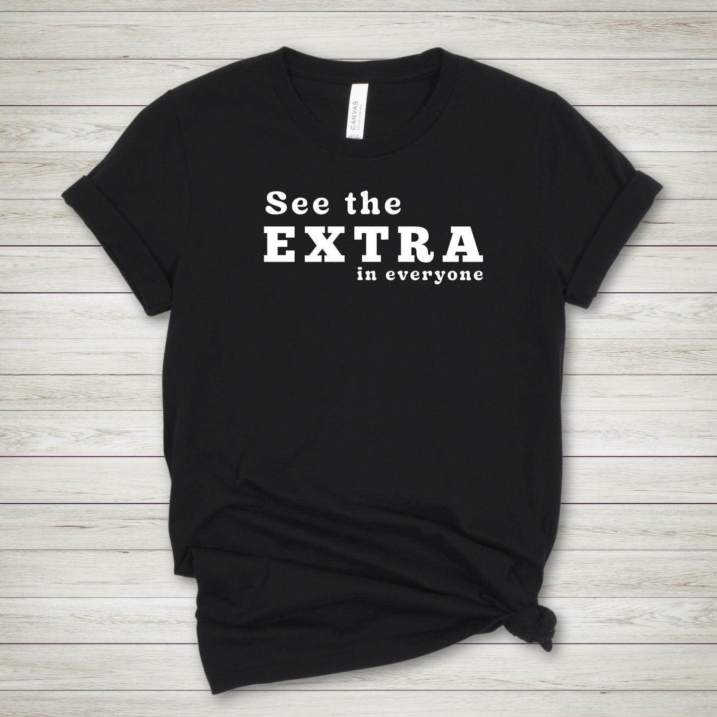 See the EXTRA Tee